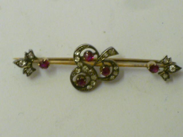 Appraisal: A VICTORIAN RUBY AND DIAMOND BROOCH modelled as a shamrock