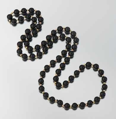 Appraisal: A Ladies' Onyx and Gold Bead Necklace Continuous strand of