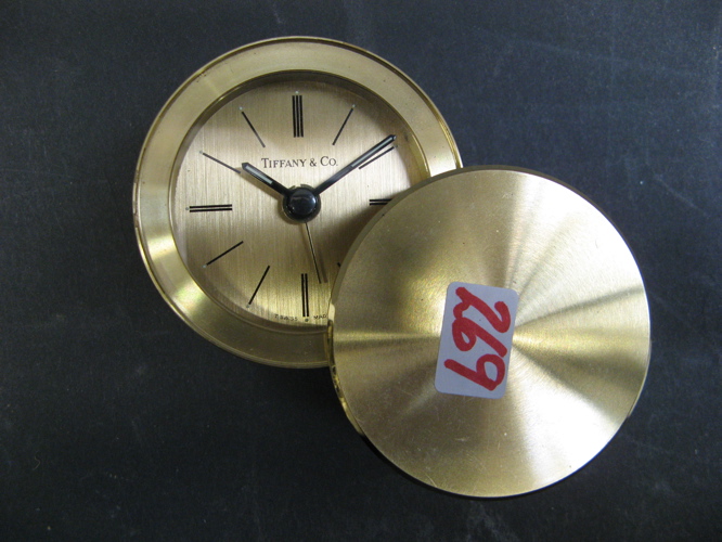 Appraisal: TIFFANY CO GILT METAL TRAVEL ALARM CLOCK having a Swiss