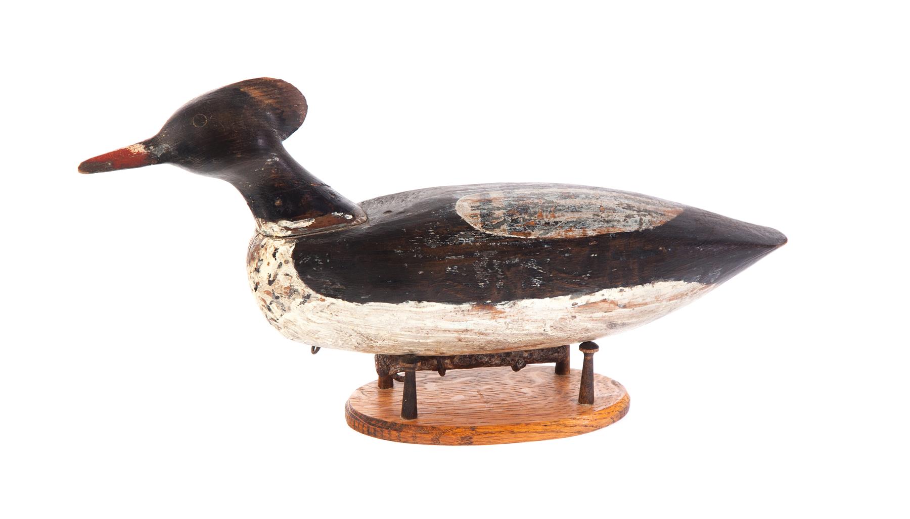 Appraisal: AMERICAN DUCK DECOY Early th century Folksy carved merganser in