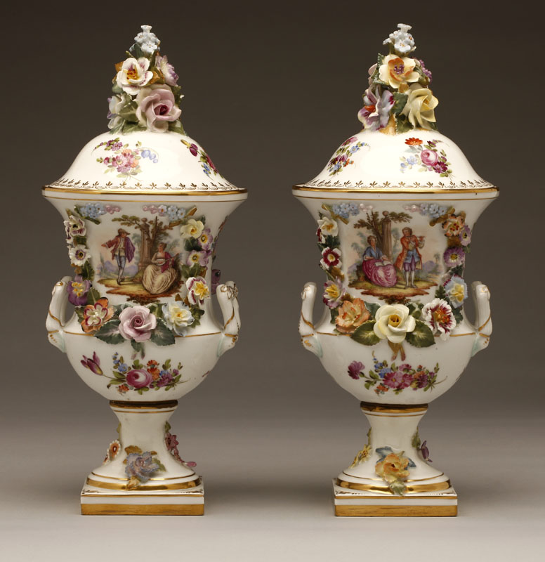 Appraisal: A pair of Carl Theime Dresden porcelain floral decorated covered