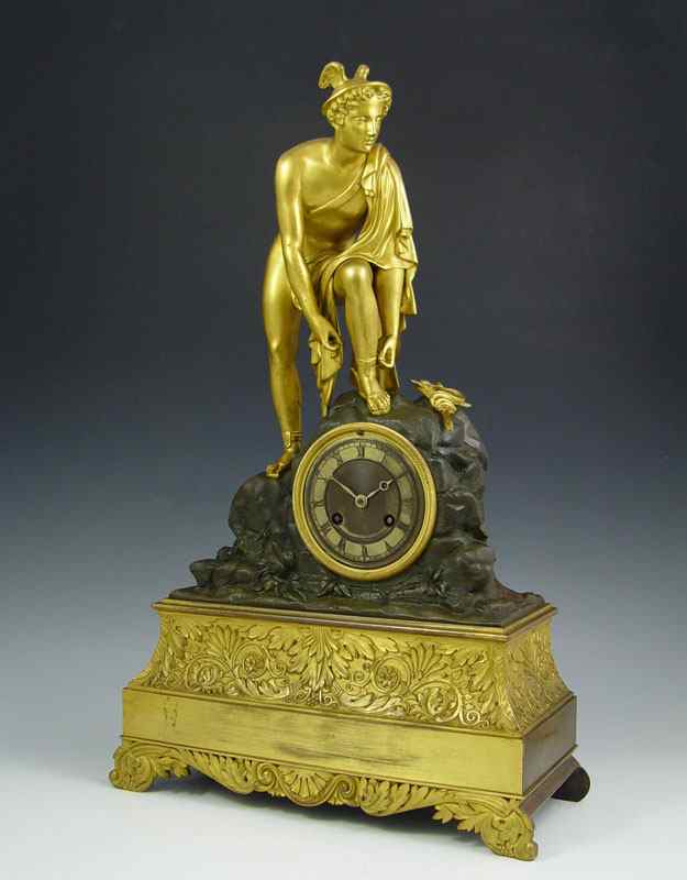 Appraisal: FRENCH FIGURAL MERCURY CLOCK Mixed metal brass and bronze with