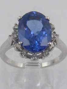 Appraisal: A white metal tests ct gold tanzanite and diamond ring