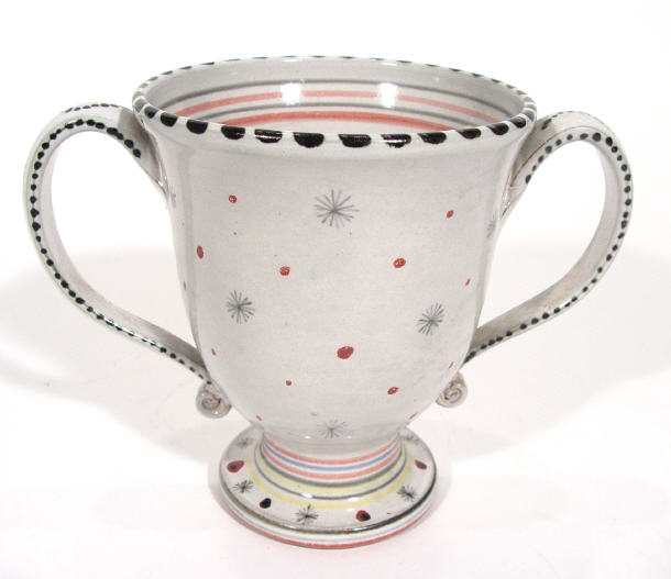 Appraisal: Rye Pottery loving cup hand painted with red and black