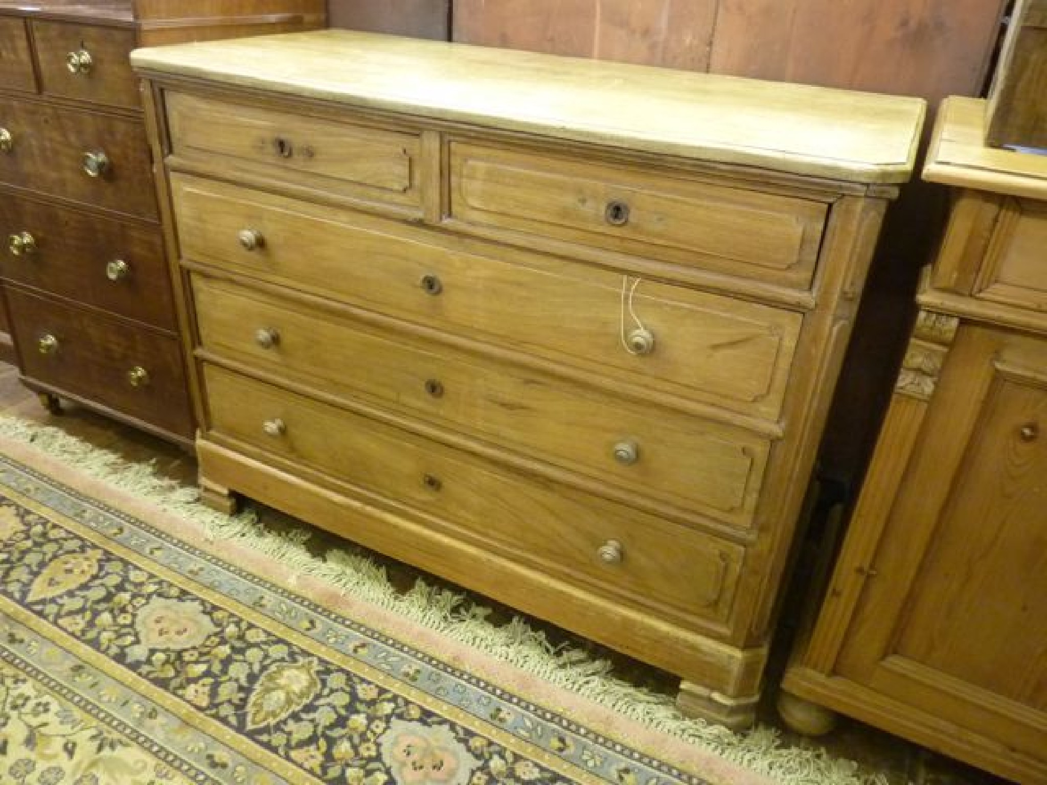 Appraisal: A French provincial chest of three long and two short