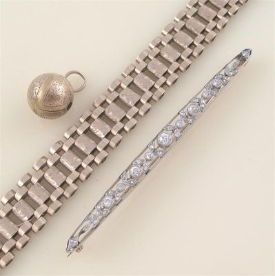 Appraisal: A diamond set foliate bar brooch set in gold cm