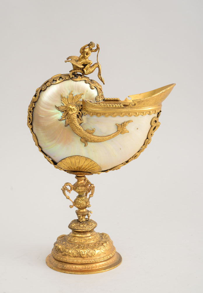 Appraisal: GERMAN RENAISSANCE STYLE GILT-METAL-MOUNTED NAUTILUS SHELL EWER The shell with