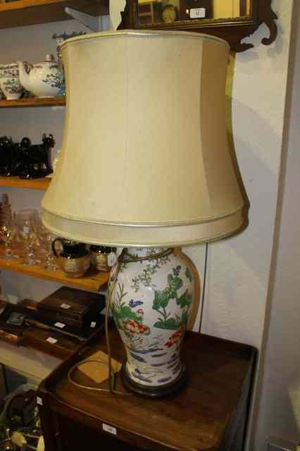 Appraisal: A CONTEMPORARY CHINESE STYLE PORCELAIN LARGE BALUSTER TABLE LAMP with