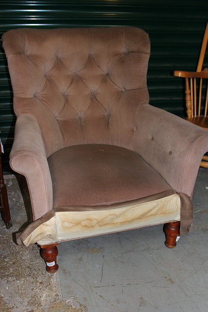 Appraisal: A LATE TH EARLY TH CENTURY BUTTON UPHOLSTERED ARMCHAIR with