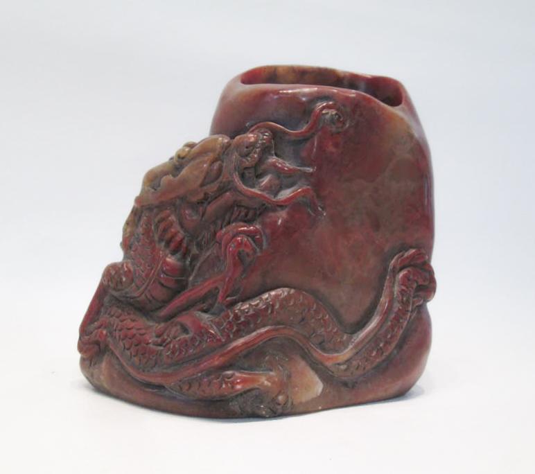 Appraisal: CHINESE CARVED SHOUSHAN STONE BRUSH POT with raised dragon motif