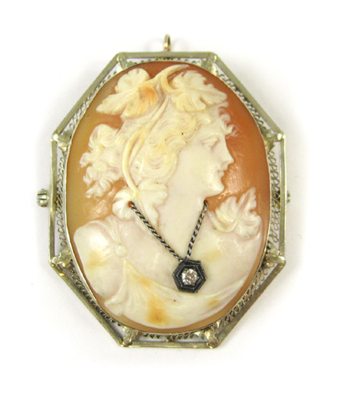 Appraisal: VICTORIAN CAMEO PENDANT BROOCH framed in k white gold is