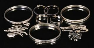 Appraisal: Tiffany Co Sterling Jewelry Tiffany sterling bangle bracelets with padlock