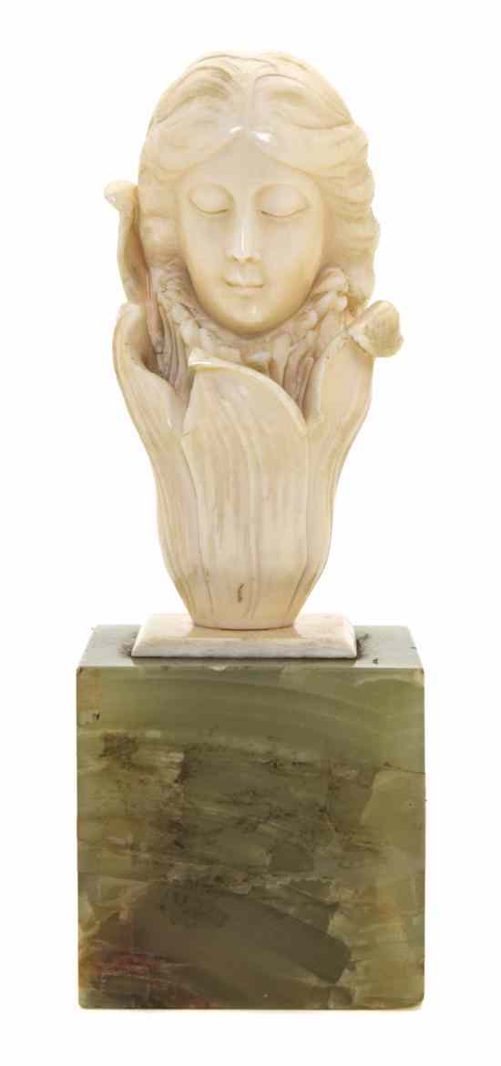 Appraisal: A Continental Art Nouveau Ivory Bust depicting a lady issuing