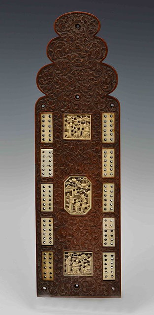 Appraisal: A CHINESE CARVED BOXWOOD CRIB BOARD with inset carved ivory