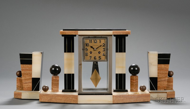 Appraisal: Art Deco Clock with Matching Book Ends Stone and metal