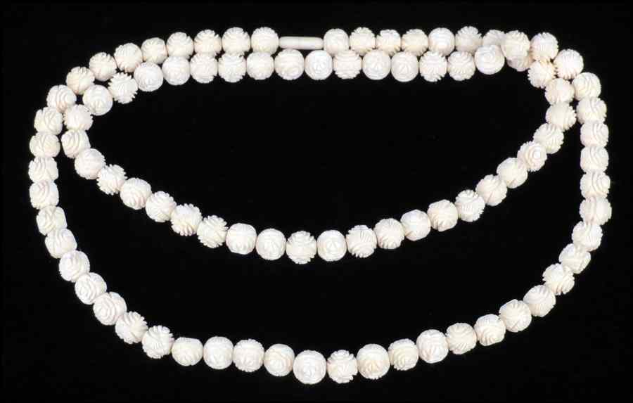 Appraisal: CARVED IVORY BEAD NECKLACE mm - mm Length '' Condition