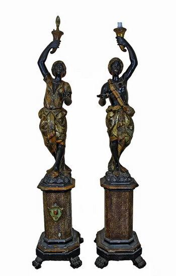 Appraisal: A pair of th Century painted and decorated blackamoor figures