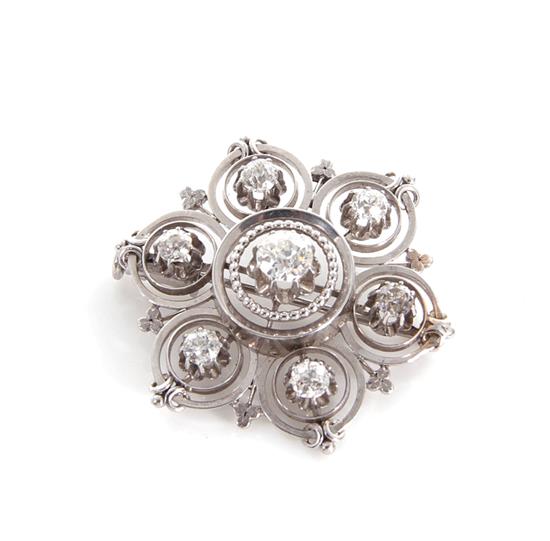 Appraisal: Diamond and white gold brooch approx ctw round diamonds in