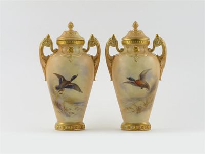 Appraisal: A pair of Royal Worcester Grainger blush porcelain vases and