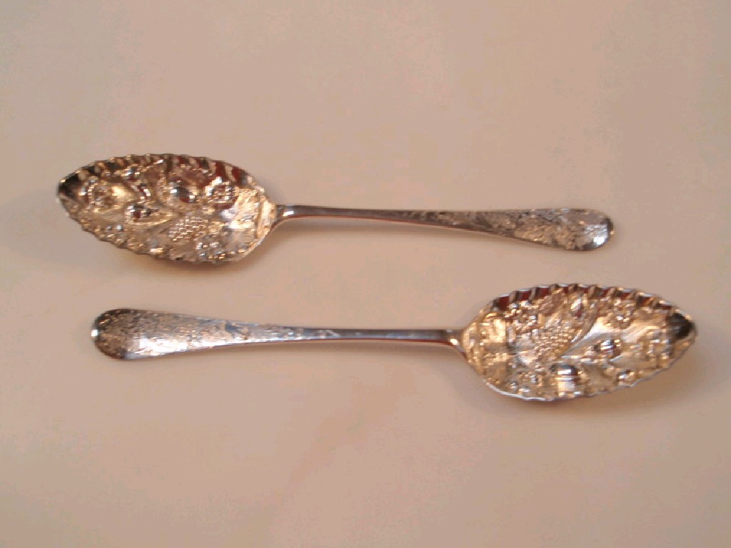 Appraisal: A pair of George III silver berry spoons maker RS