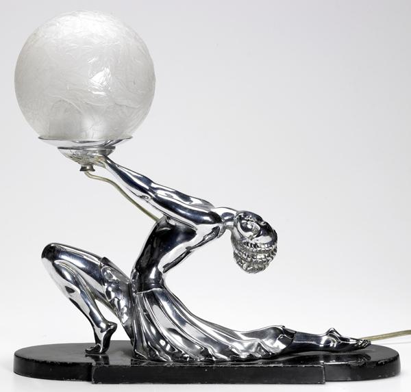 Appraisal: FRANKART Mantle lamp with chrome figure and frosted spherical glass