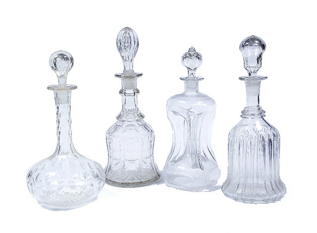 Appraisal: A waisted glass decanter and stoppercirca and three other decanters