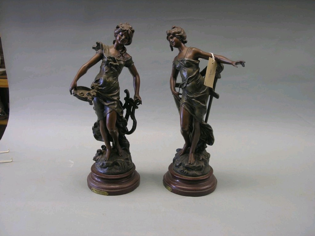 Appraisal: A pair of late th century French bronzed spelter statuettes