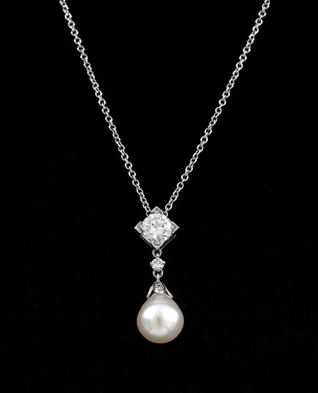 Appraisal: PLATINUM CULTURED PEARL AND DIAMOND NECKLACE One MM pearl is