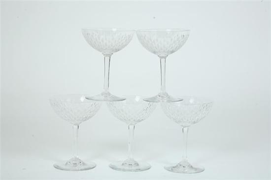 Appraisal: FIVE PIECES OF BACCARAT STEMWARE Clear champagnes in diamond pattern