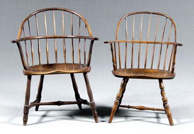 Appraisal: Two similar sack-back Windsor armchairs each with spindle back shaped