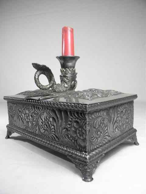 Appraisal: Victorian silver plated figural humidor with candlestick Figural dolphin candlestick