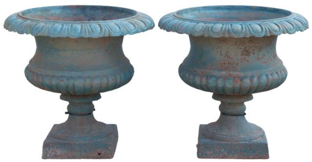 Appraisal: pair Cast iron garden urn planters in a green painted