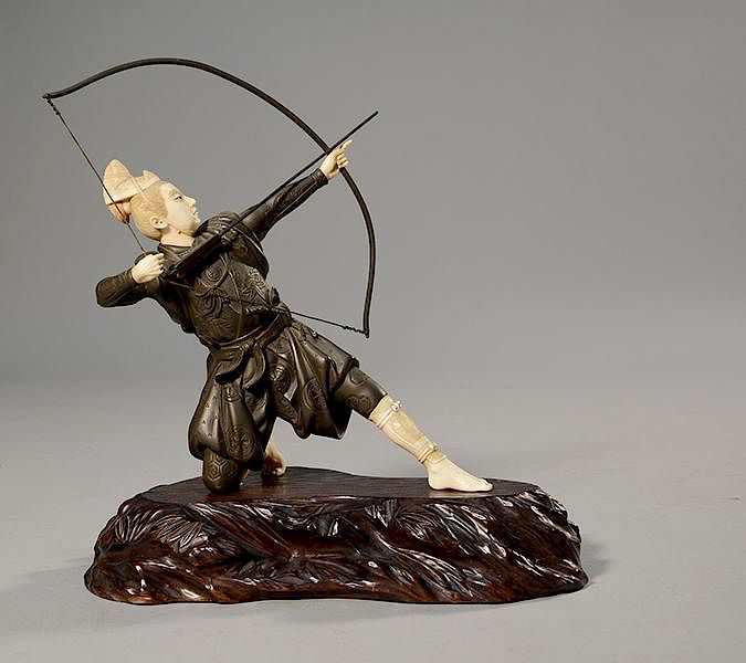 Appraisal: Japanese Meiji period bronze and ivory Samurai archer Japanese Meiji