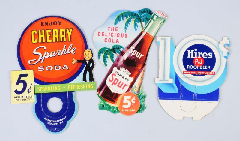 Appraisal: Lot Of Assorted Soda Bottle Toppers Includes a Spur fan