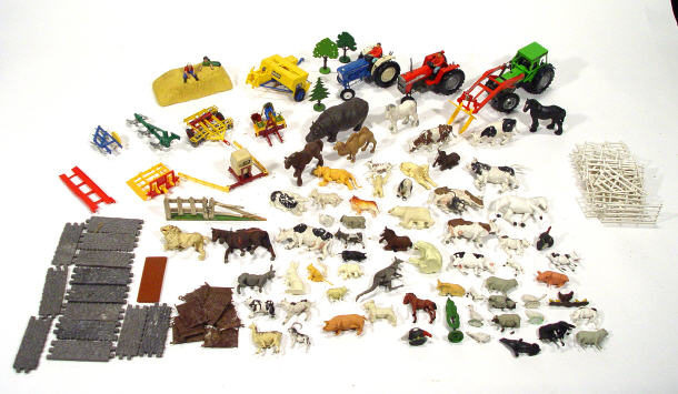 Appraisal: Collection of Britains plastic farmyard animals tractors and accessories and