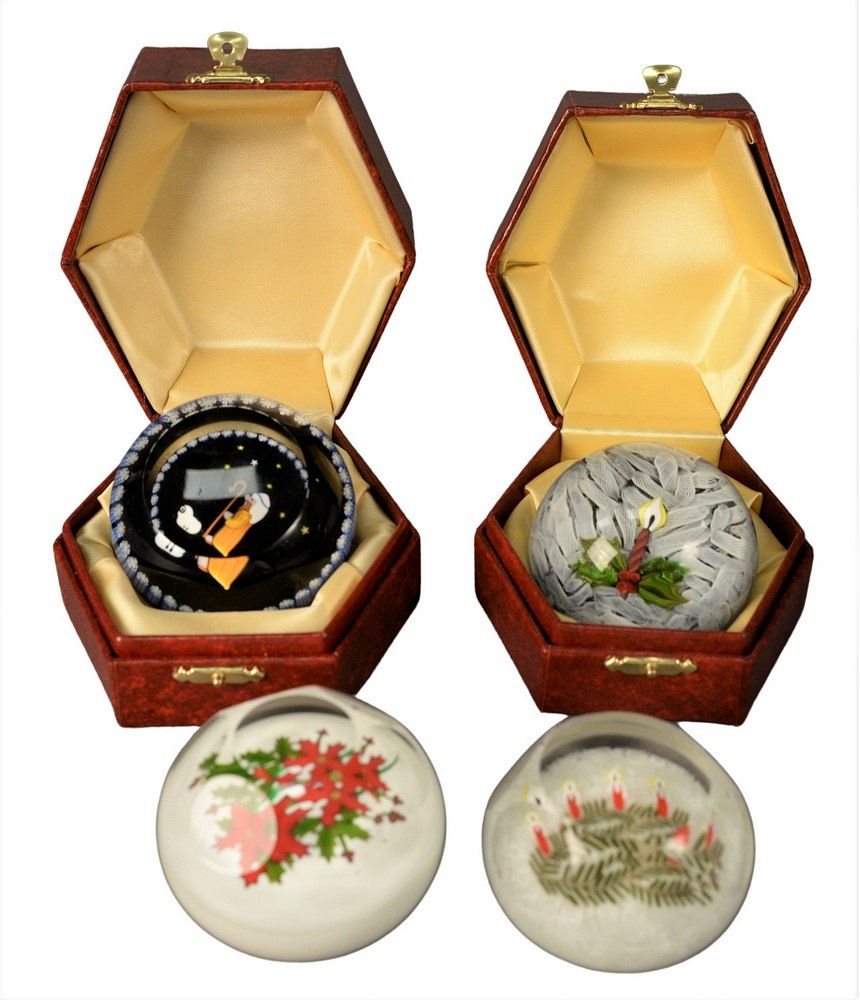 Appraisal: Four Perthshire Paperweights having holiday themed interiors two in their