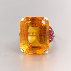 Appraisal: k RING WITH A Ct CITRINE WITH RUBIES AND DIAMONDS