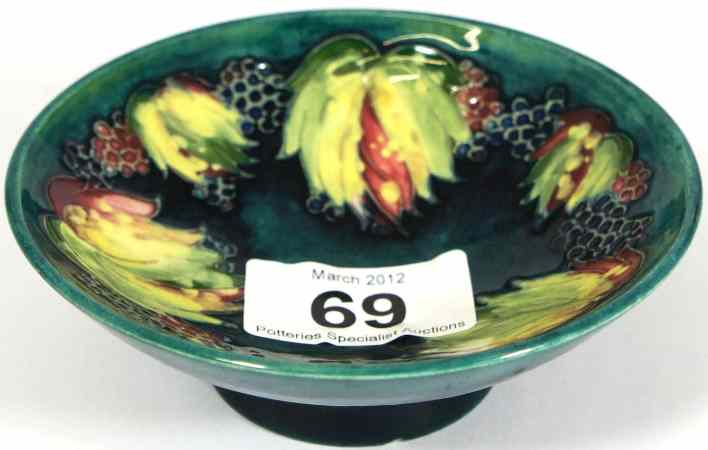 Appraisal: Moorcroft Grape and Leaf Design Footed Finger Bowl on Blue