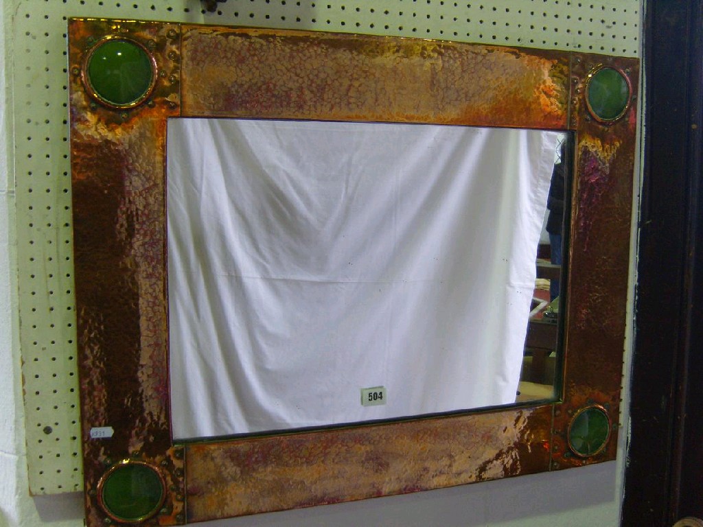 Appraisal: A large copper framed mirror in the Arts Crafts style