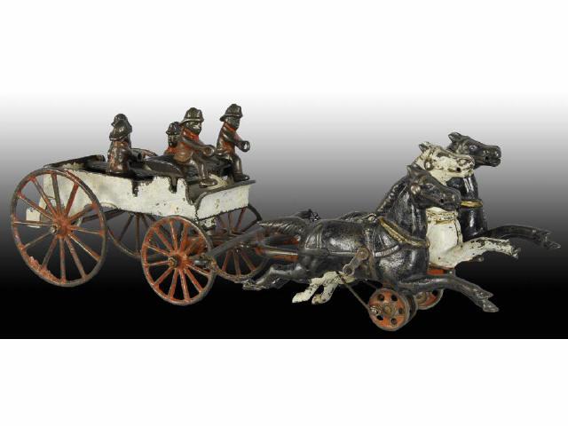 Appraisal: Cast Iron Dent Horse-Drawn Fire Patrol Wagon Toy Description An