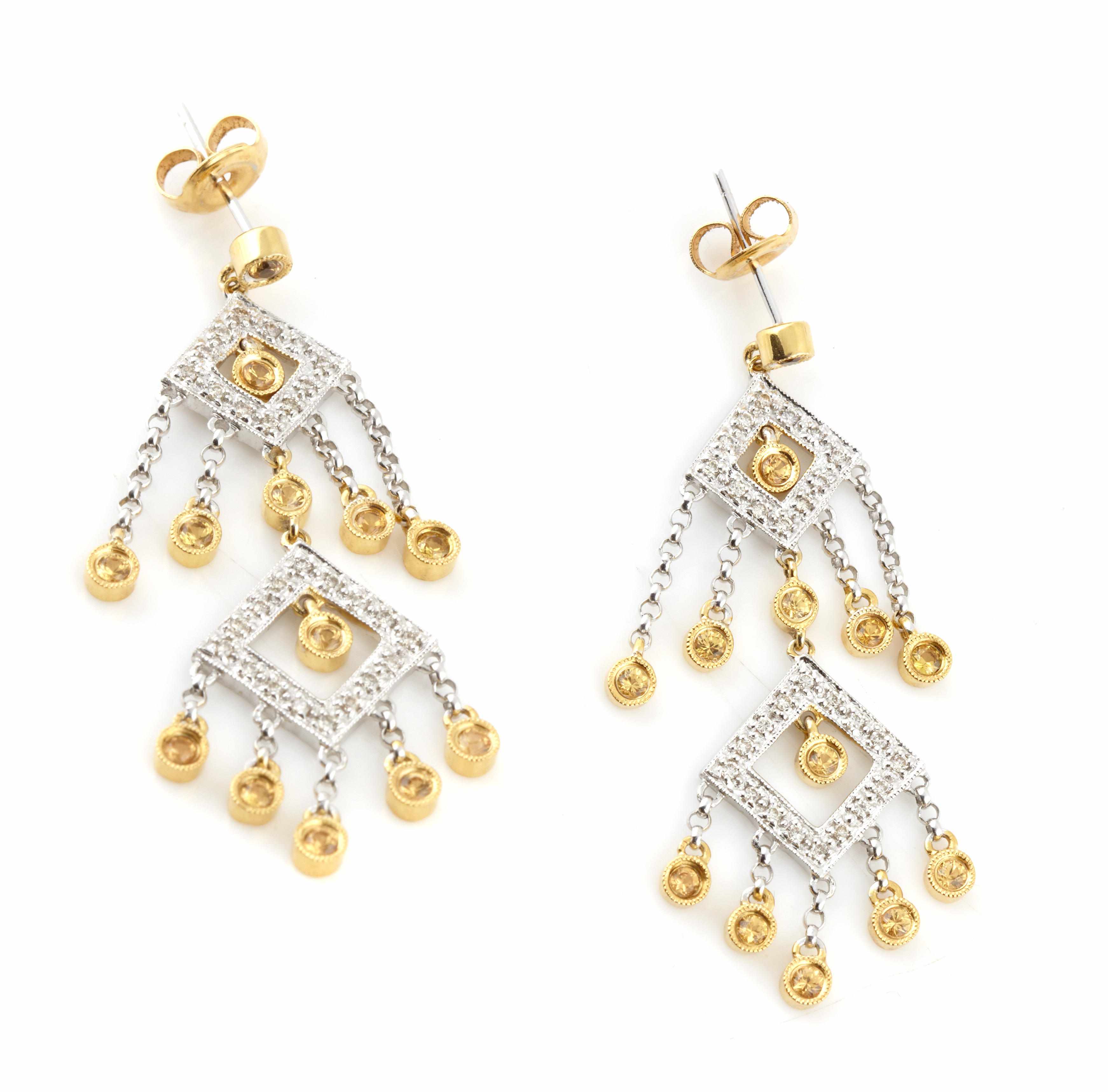 Appraisal: A pair of citrine diamond and bicolor gold earrings length