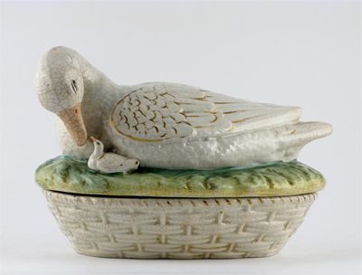 Appraisal: A Staffordshire duck tureen and cover the mother bird bending