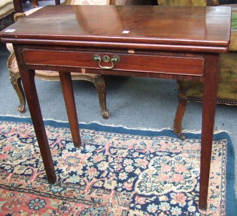 Appraisal: A late th century mahogany tea table the hinged rectangular