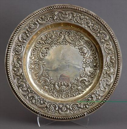 Appraisal: WILLIAM III ARMORIAL SILVER BASIN The everted rim with gadroon