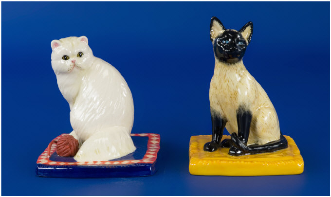 Appraisal: Two Royal Doulton Cats Siamese RDA and Persian RDA each