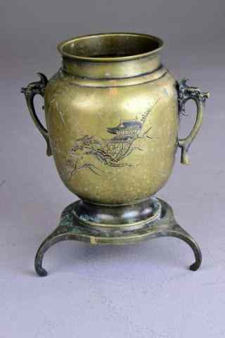 Appraisal: JAPANESE METAL URNDouble-handled open -legged urn engraved on front with