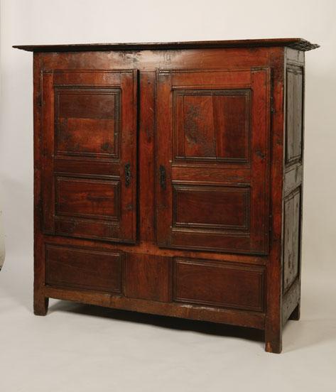 Appraisal: A TH CENTURY FRENCH FRUITWOOD ARMOIRE with a broad flat