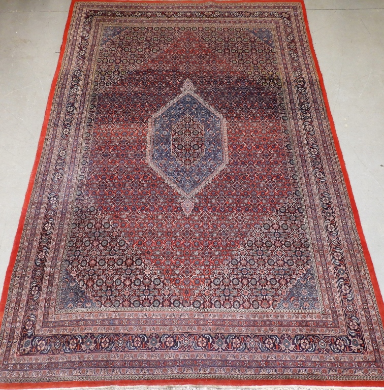 Appraisal: PERSIAN WOOL ROOM SIZE CARPET RUG Persia th CenturyBlue central