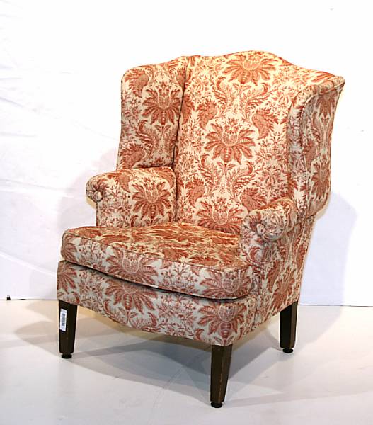 Appraisal: A George III style mahogany wing chair th century height