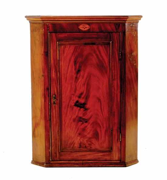 Appraisal: George III inlaid mahogany hanging corner cupboard early th century